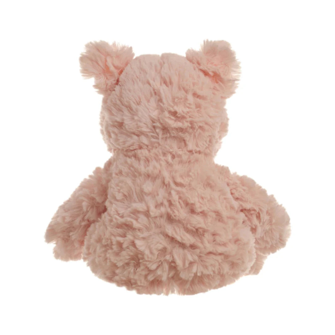 Snuggable Pig rear view — soft faux-fur microwavable comfort toy, heat pouch only (see pack instructions).