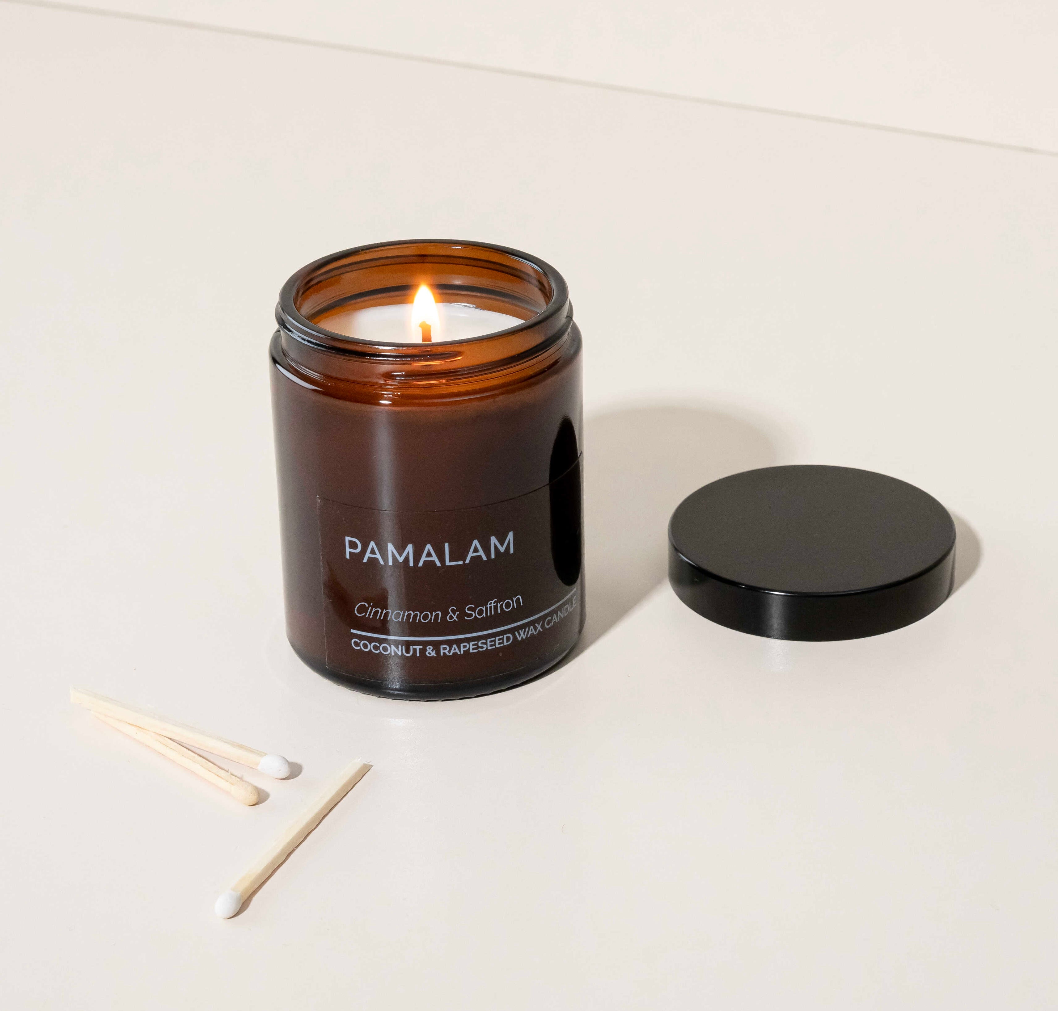 Pamalam Cinnamon and Saffron candle 180g amber glass jar