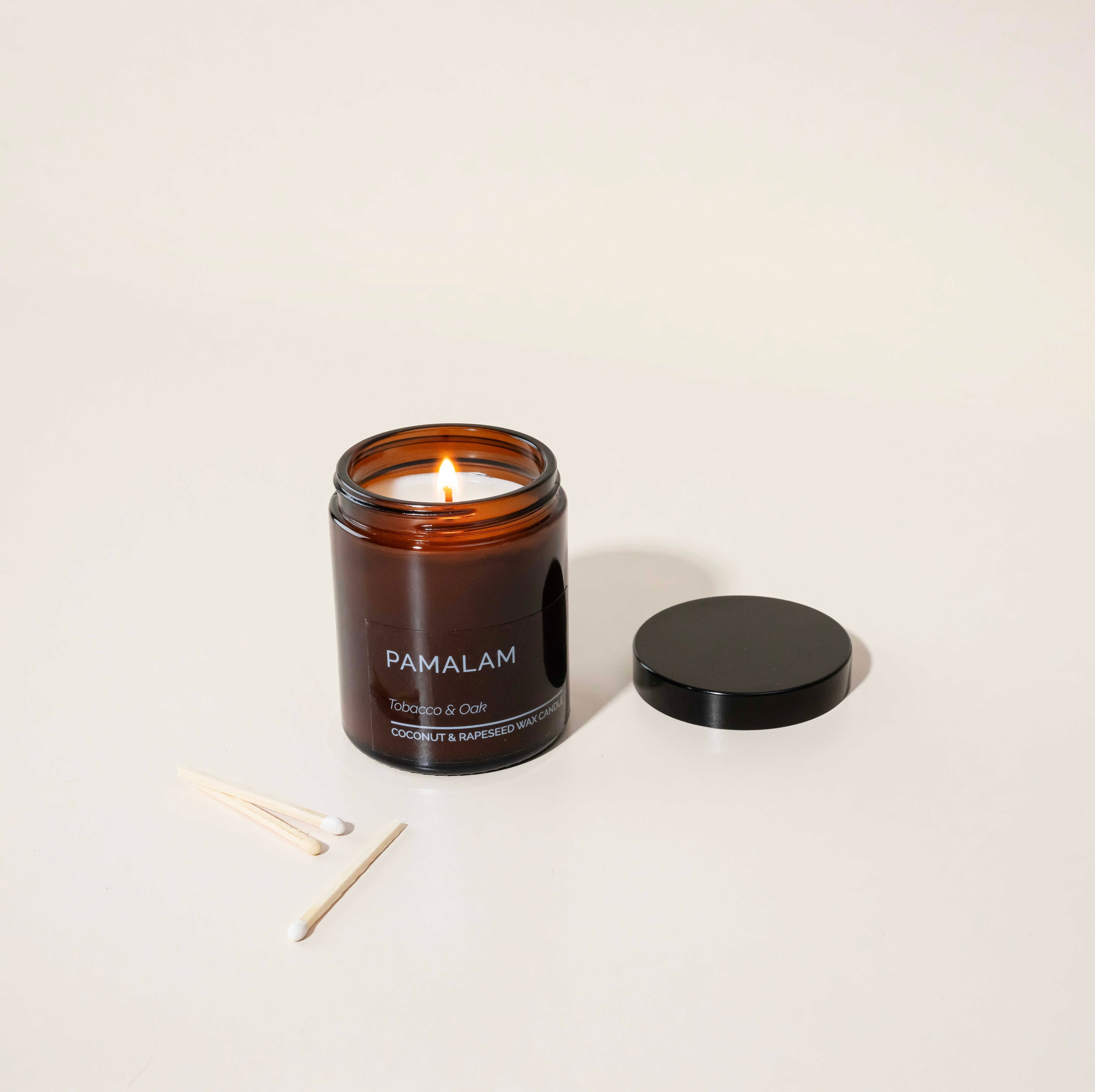 Pamalam Tobacco & Oak coconut and rapeseed wax candle in amber jar