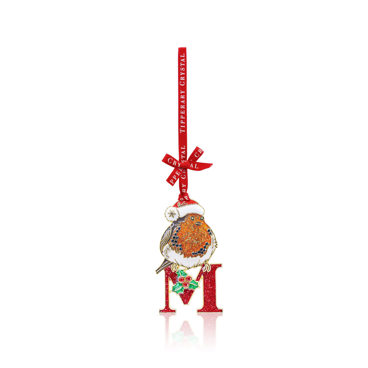 Front view of Tipperary Crystal robin ornament perched on glittered red Initial M with holly and branded red ribbon.