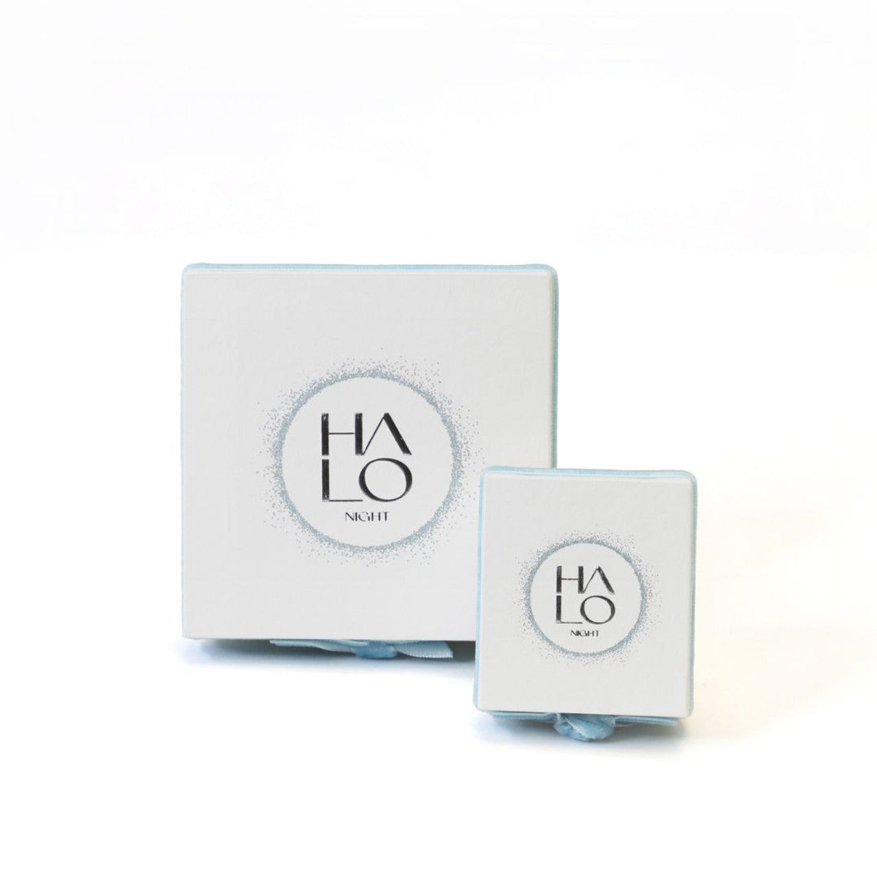 Tipperary Crystal Halo Night necklace displayed in branded gift box, in white and blue.