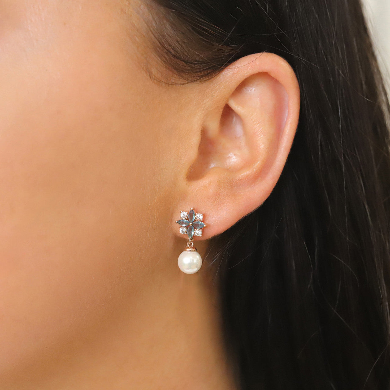 Tipperary Crystal Maureen O’Hara pearl drop earrings in rose-gold tone shown on ear.