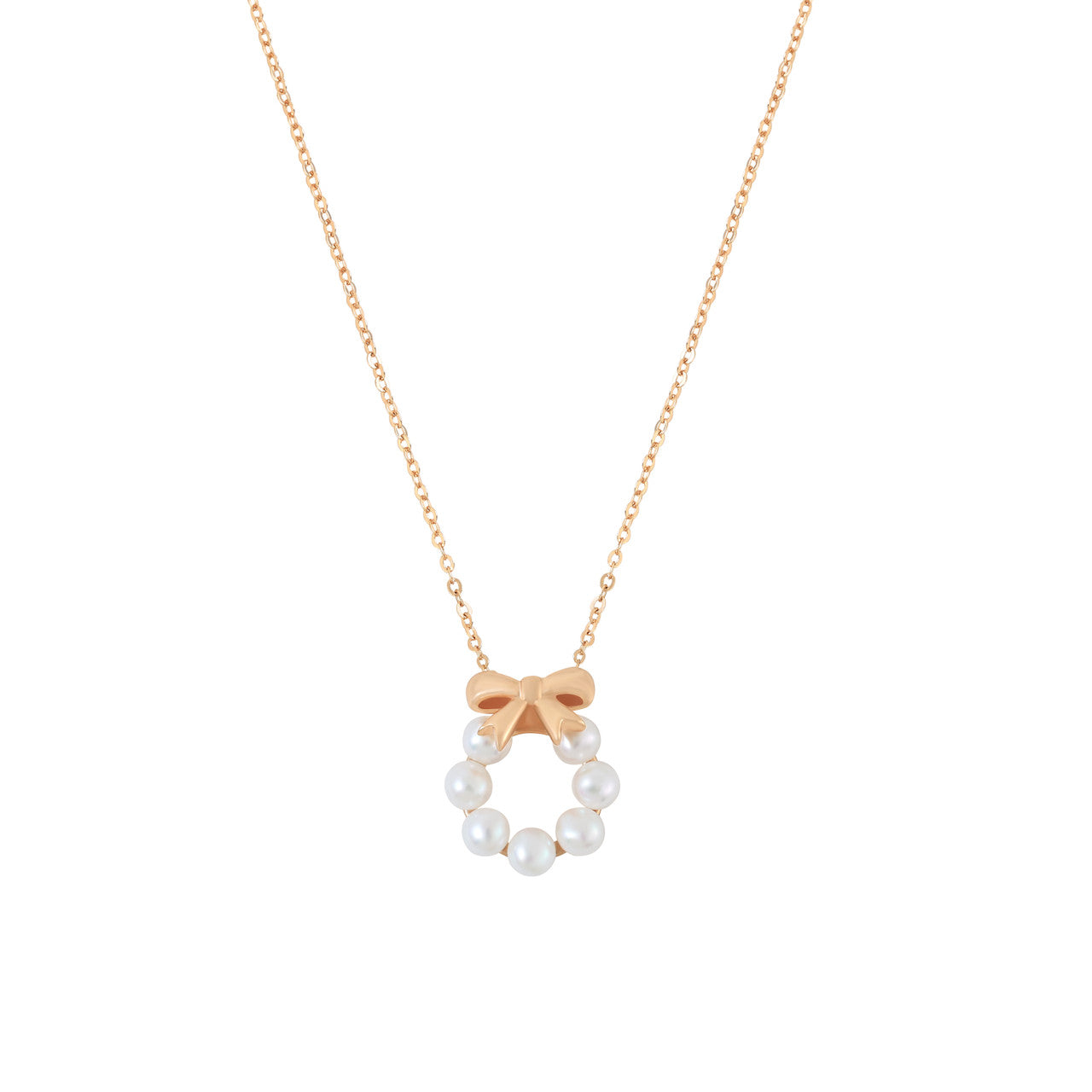 Tipperary Crystal gold pearl and bow pendant necklace on adjustable chain