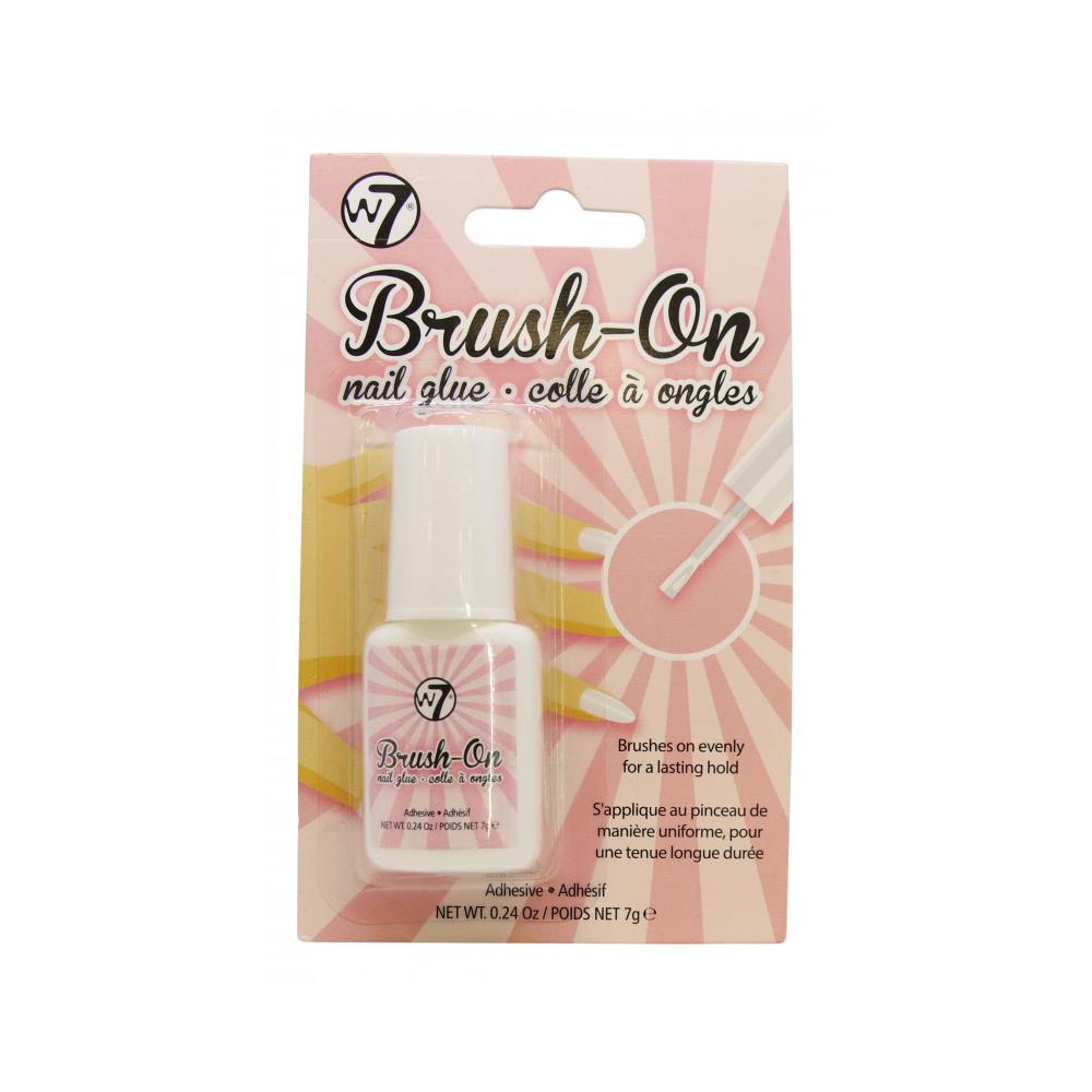 W7 Brush-On Nail Glue tube with brush applicator — long-lasting false nail adhesive.