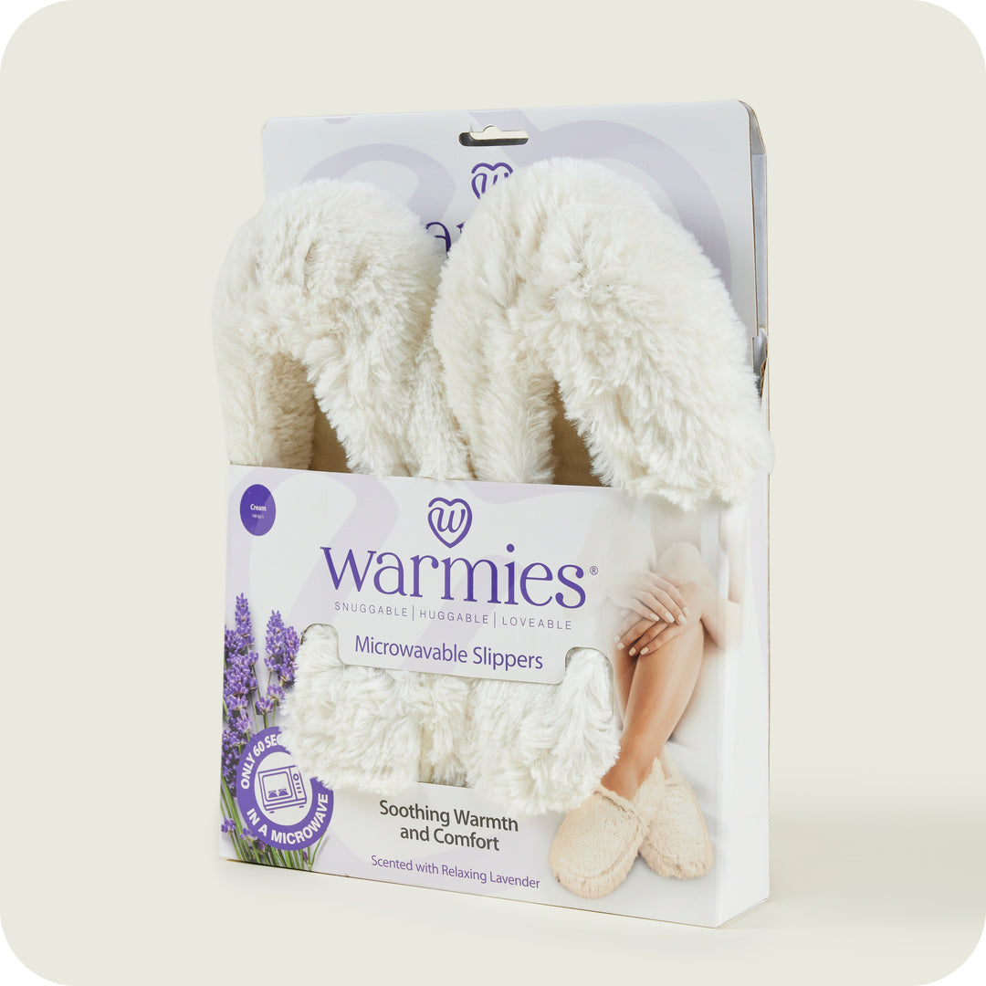 Warmies women’s microwavable cream slippers boxed showing microwavable lavender-scented slippers (UK 3–7).