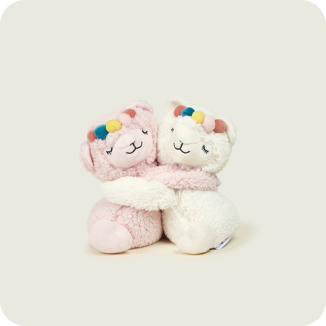 Warmies Warm Hugs Pink & White llamas — lavender-scented microwavable plush pair for kids 3+ and adults.