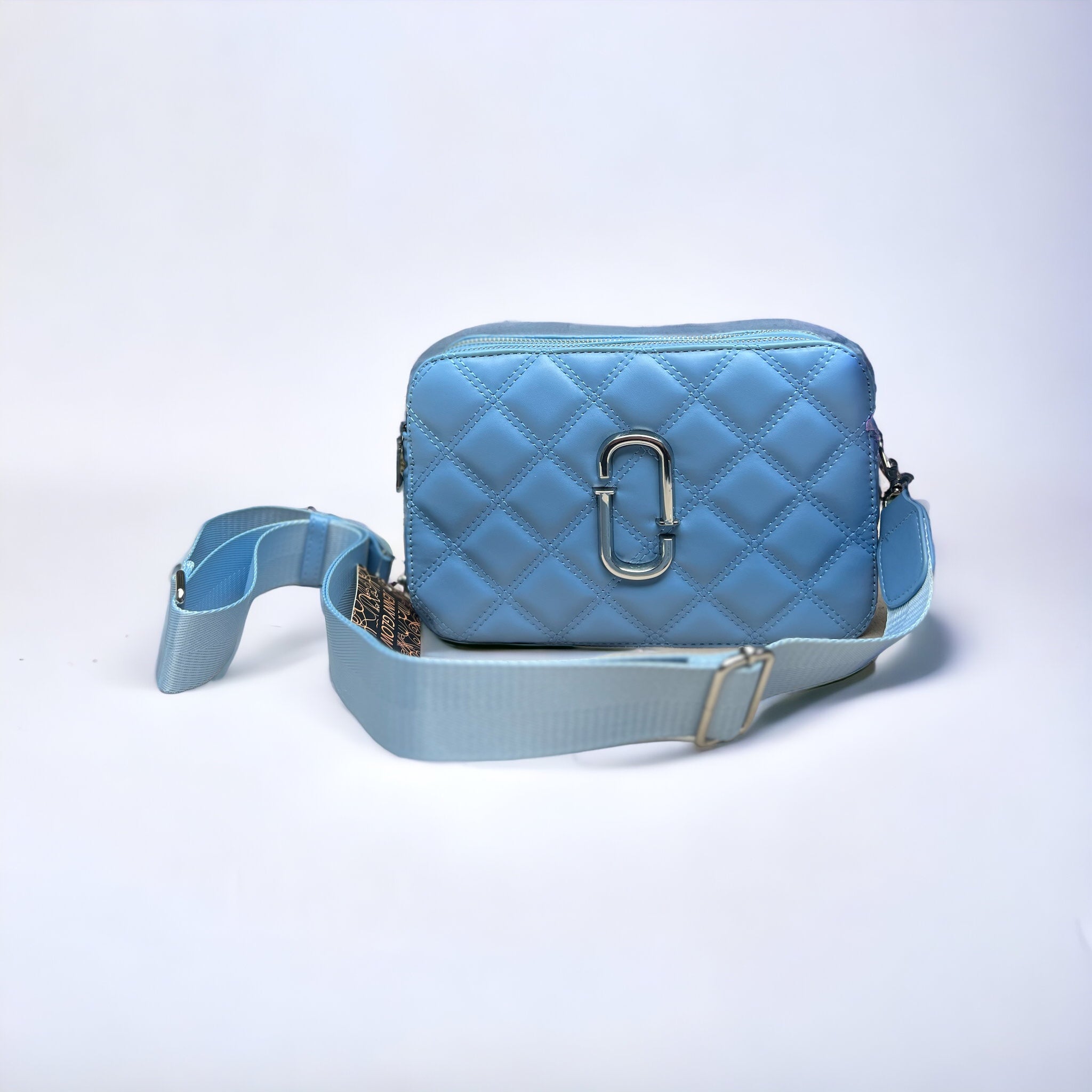 Jenny Glow Blue Quilted Logo Crossbody Handbag