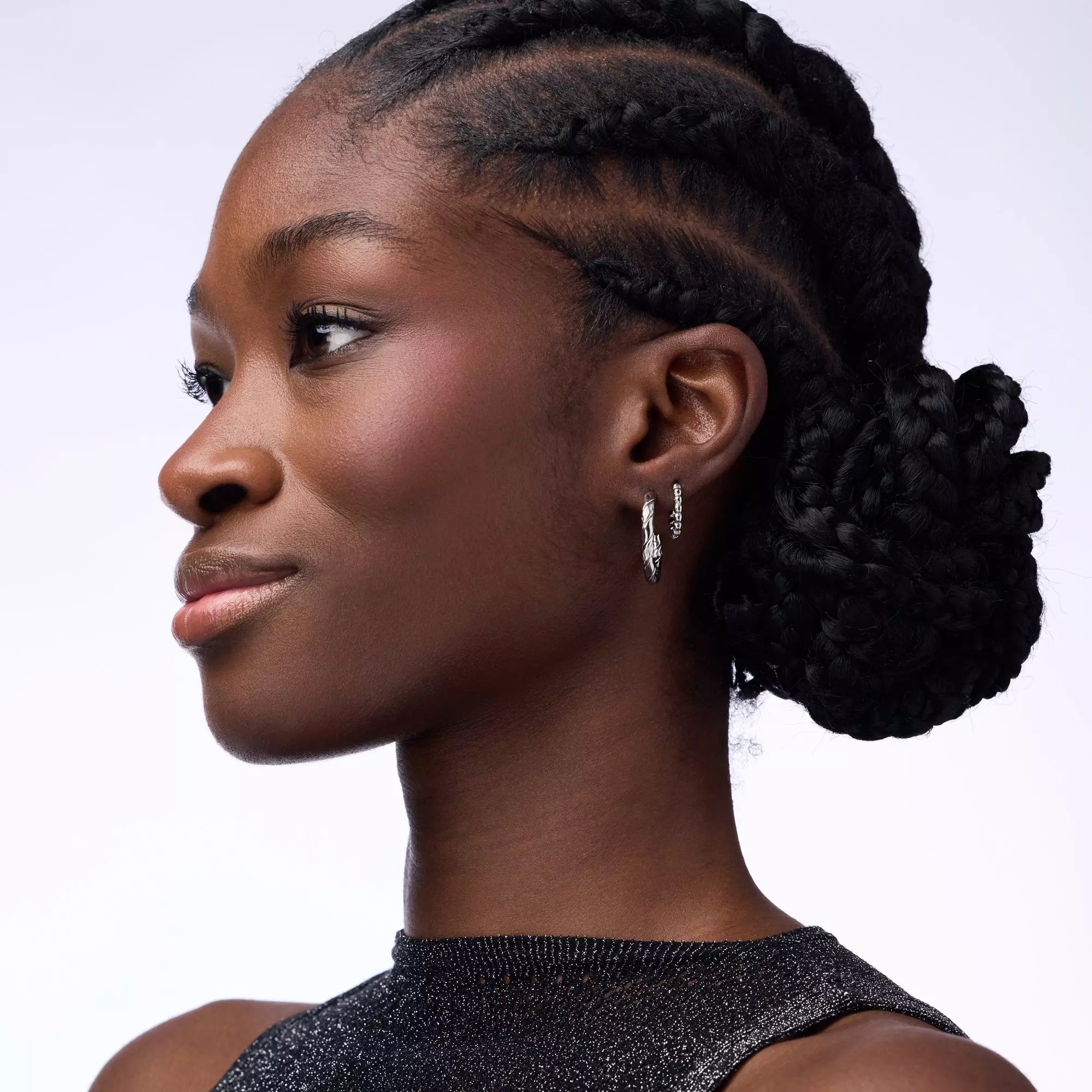 Dark skin Model Wearing Catrice AirBlush Matt Blusher 150 Wine Time on Cheeks