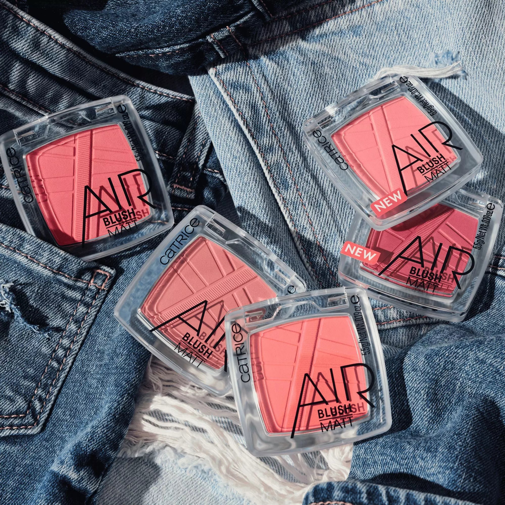 Collection of Catrice AirBlush Matt Blushers Displayed on Denim Background