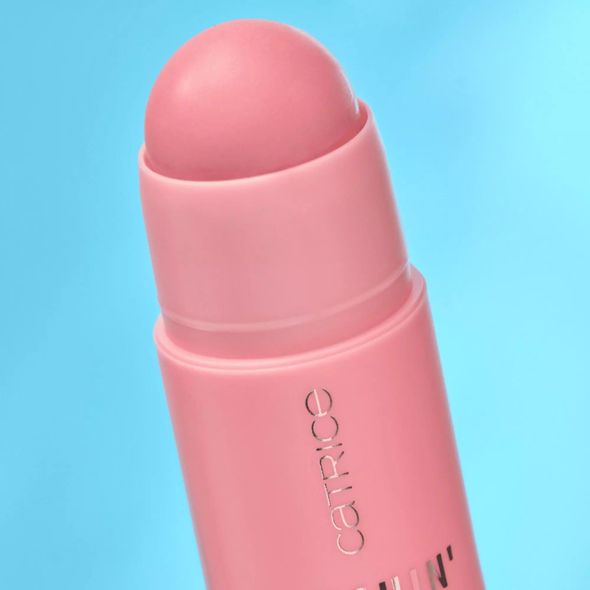 Open Catrice Blushin’ Charm Sparkle Lover Multi Stick showing light pink creamy texture Blusher