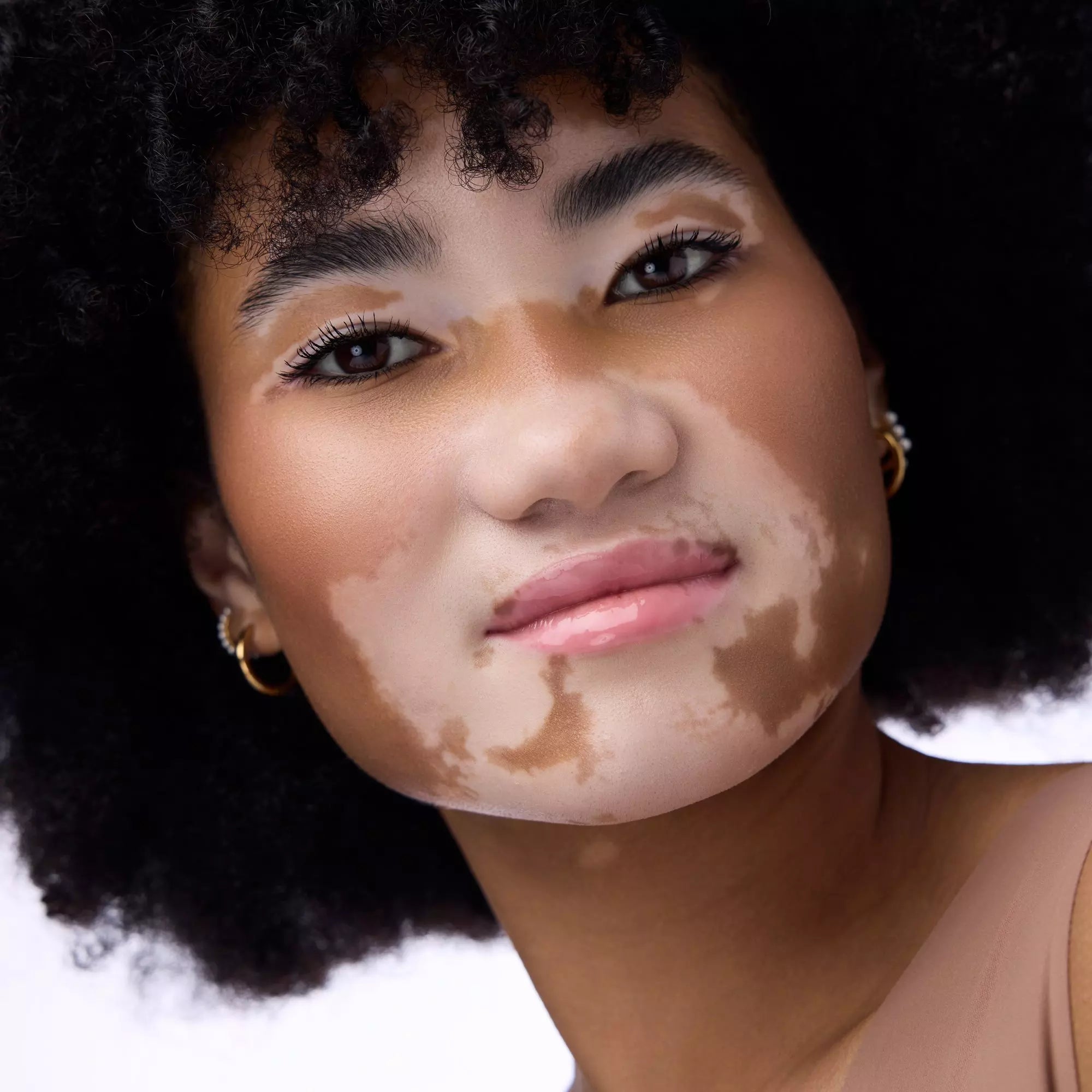 Hydrating pink lip balm Catrice Butter Drippin’ 010 Pink Lemon Squeezin’ for a natural glossy glow