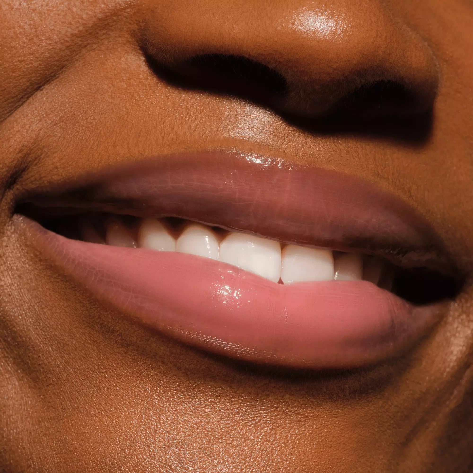 Catrice Butter Drippin’ Glossy Lip Balm 010 with soft pink tint and nourishing shea butter