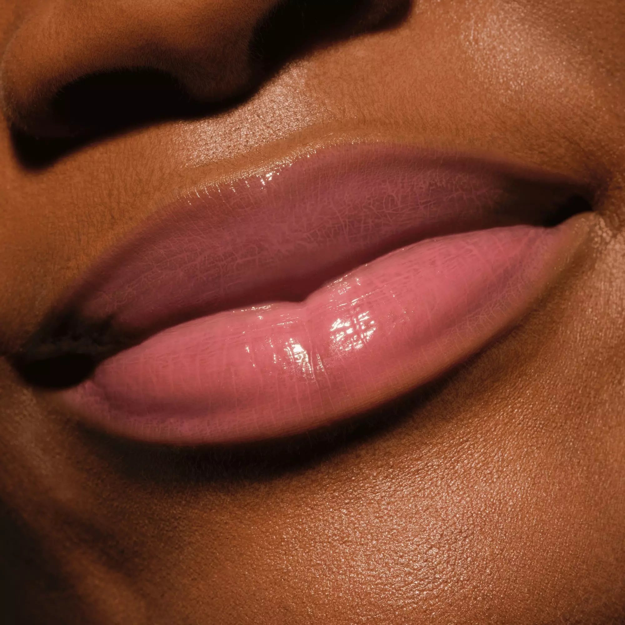 Catrice Butter Drippin’ Glossy Lip Balm 030 Butter Together on dark skin 