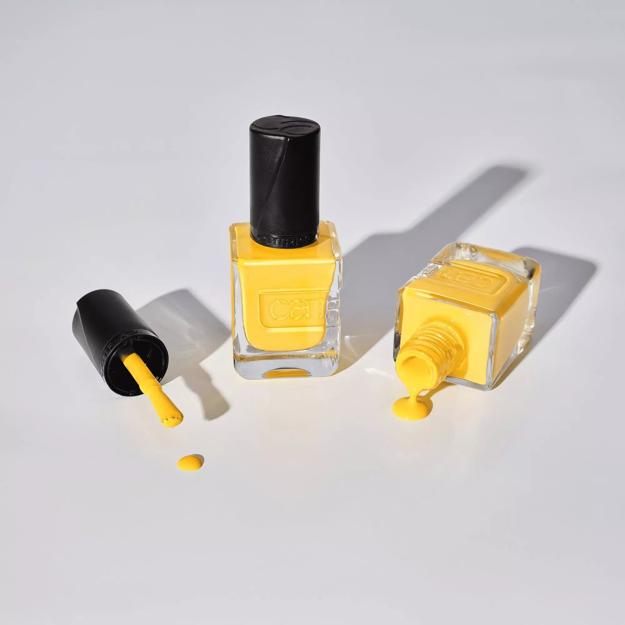 Yellow nail polish bottle with spill – Catrice 013 To Bee Or Not To Bee