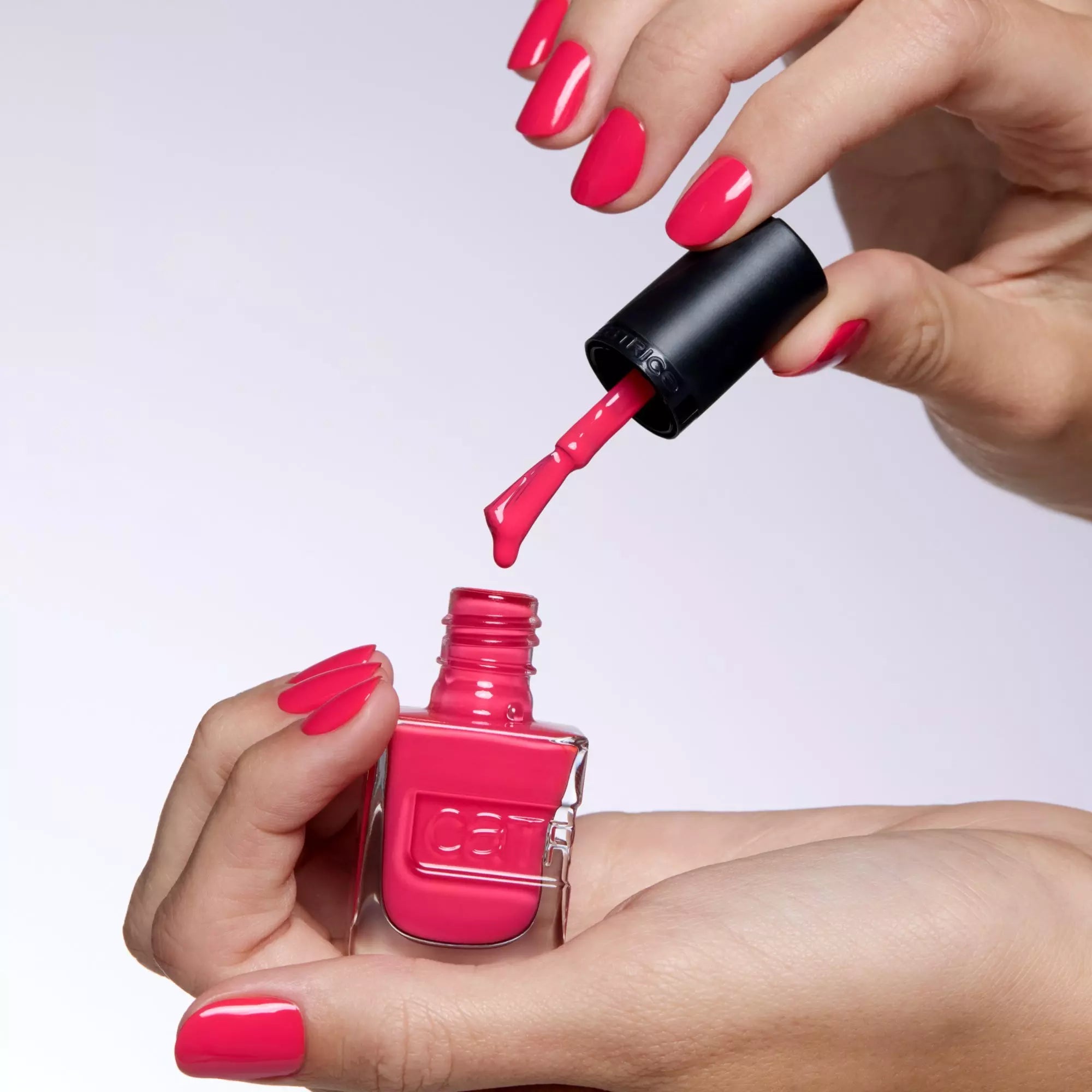 Applying Catrice Peachy Princess polish with smooth gel-like finish