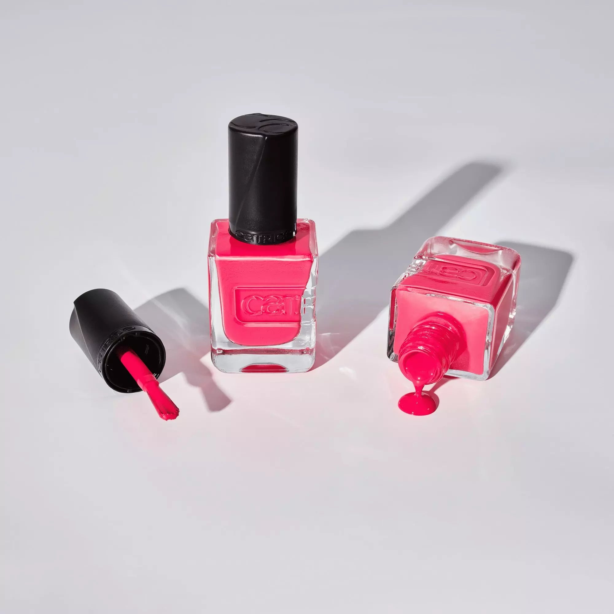 Peachy pink Catrice nail polish bottle with brush and spill – 017 Peachy Princess