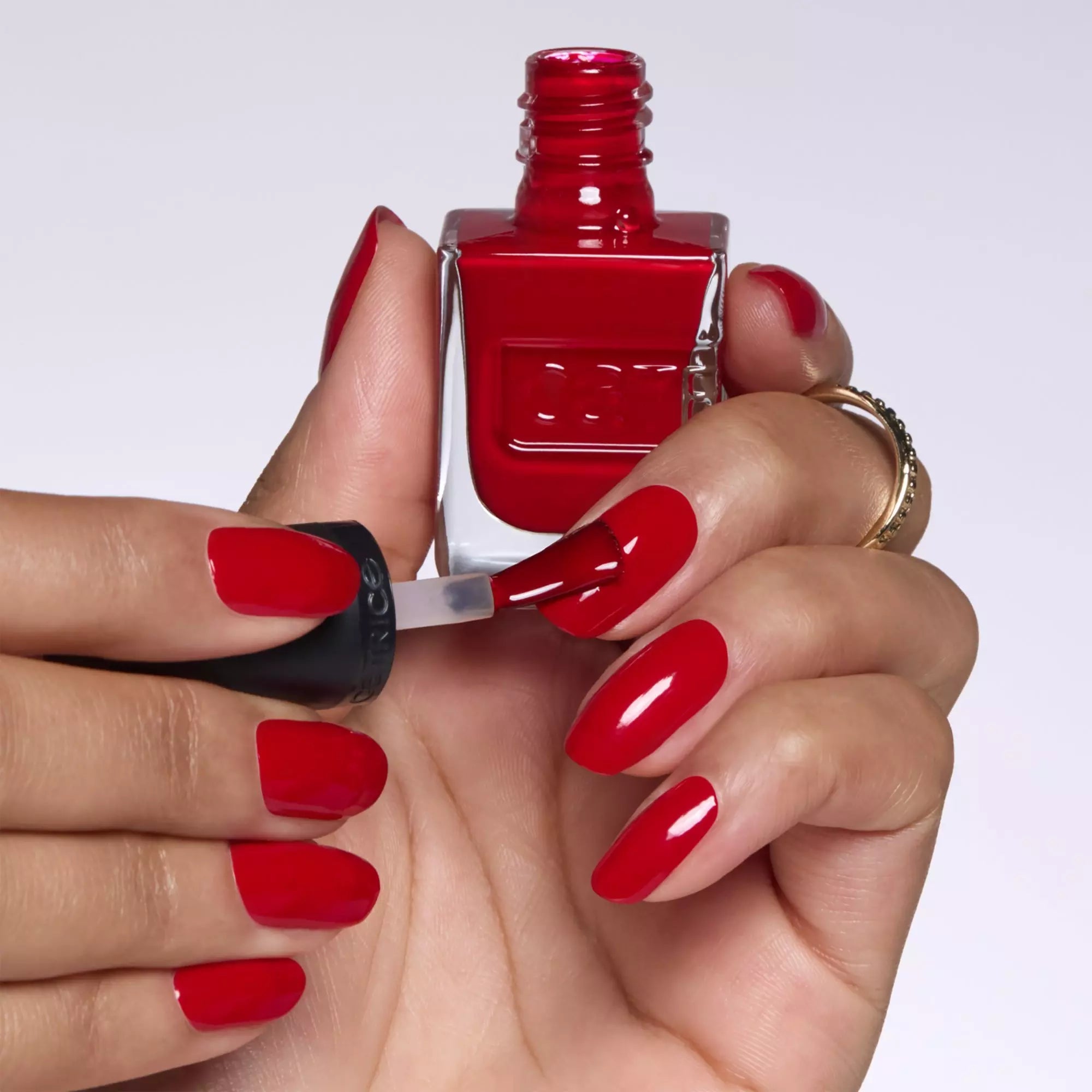 Bright red gel manicure with Catrice Gel Affair nail polish in 019