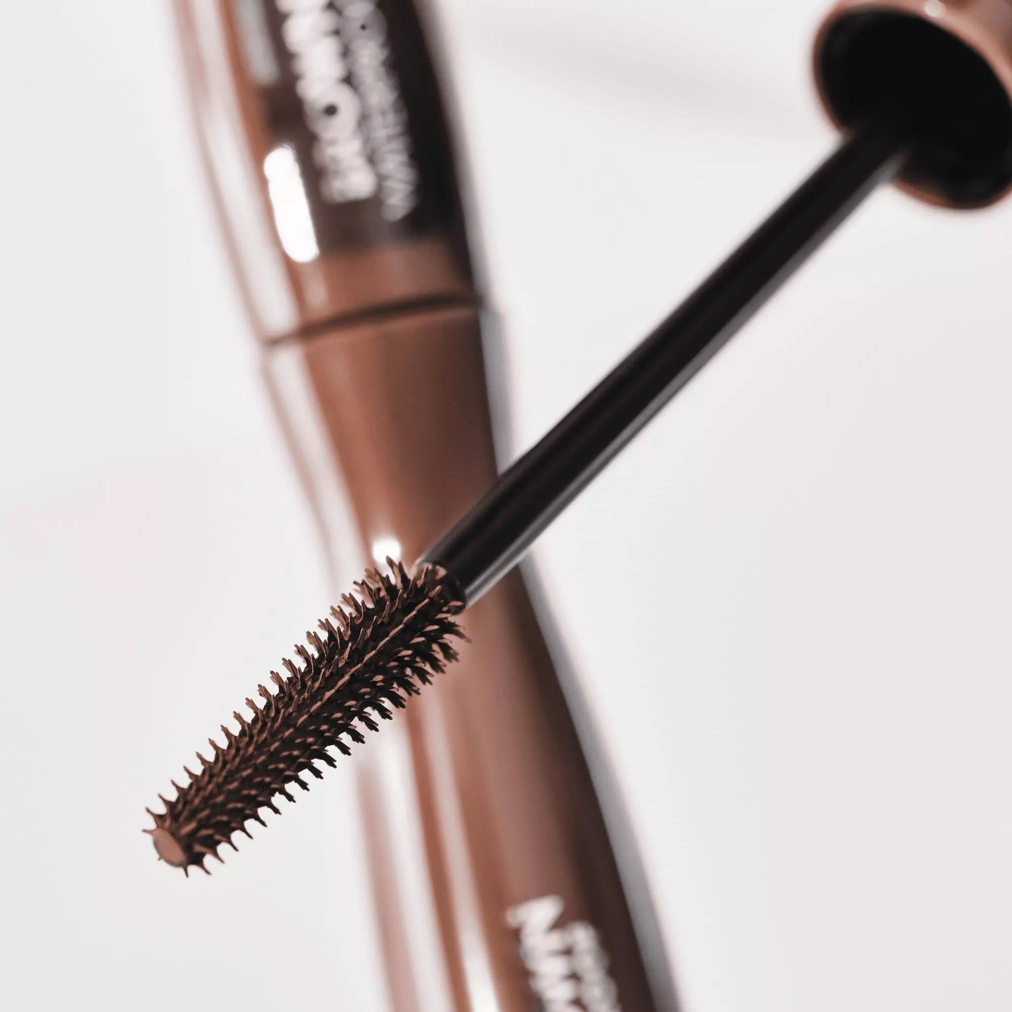 Before and after lash comparison using Catrice Glam & Doll Brown Mascara
