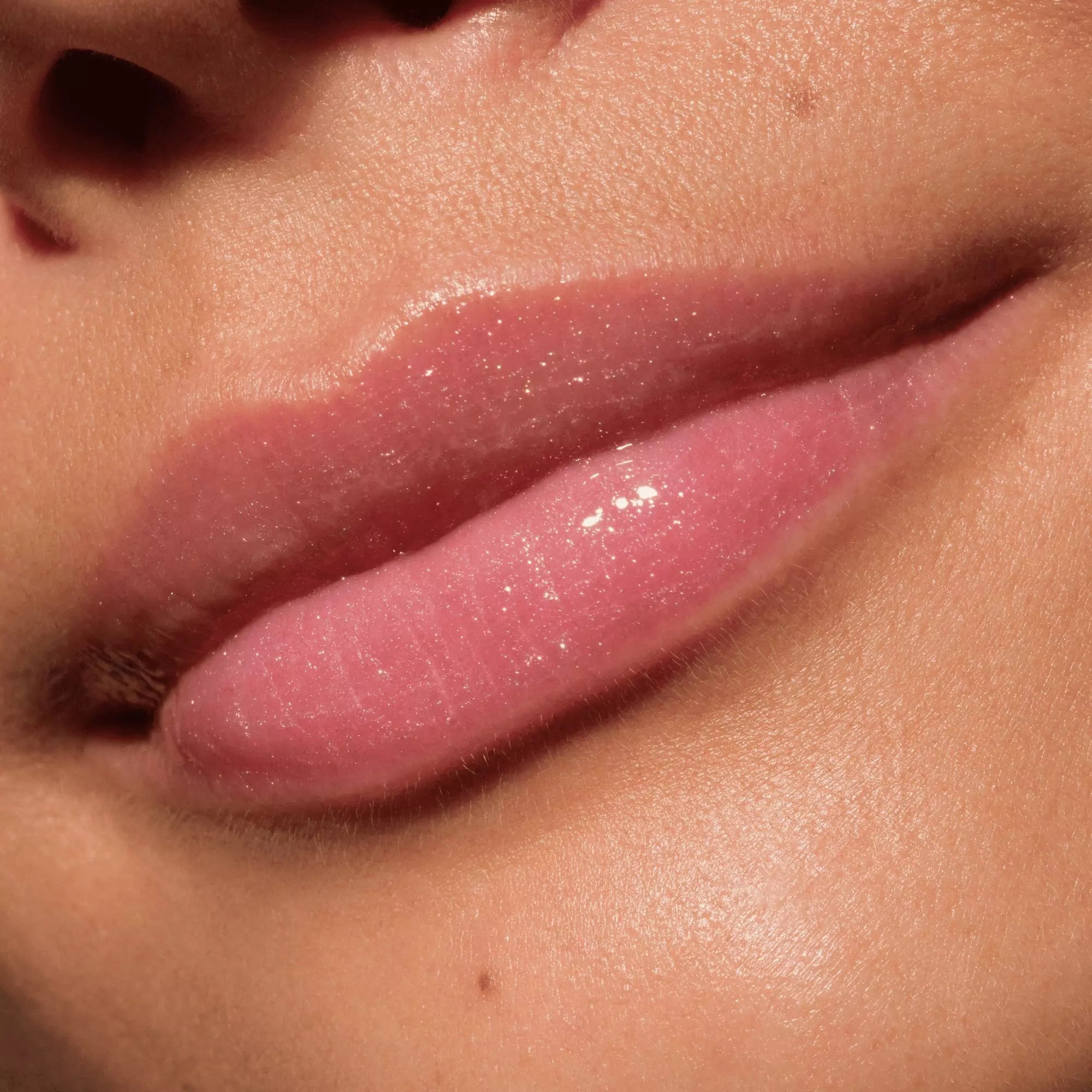 Catrice Max It Up Lip Booster Extreme 070 on lips – sheer high-shine pink glow