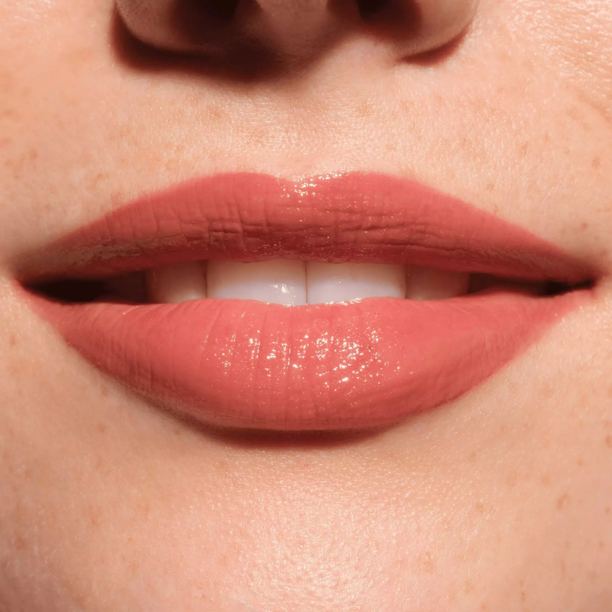 Close-up of Catrice Melt & Plump pen with black cap in shade 030
