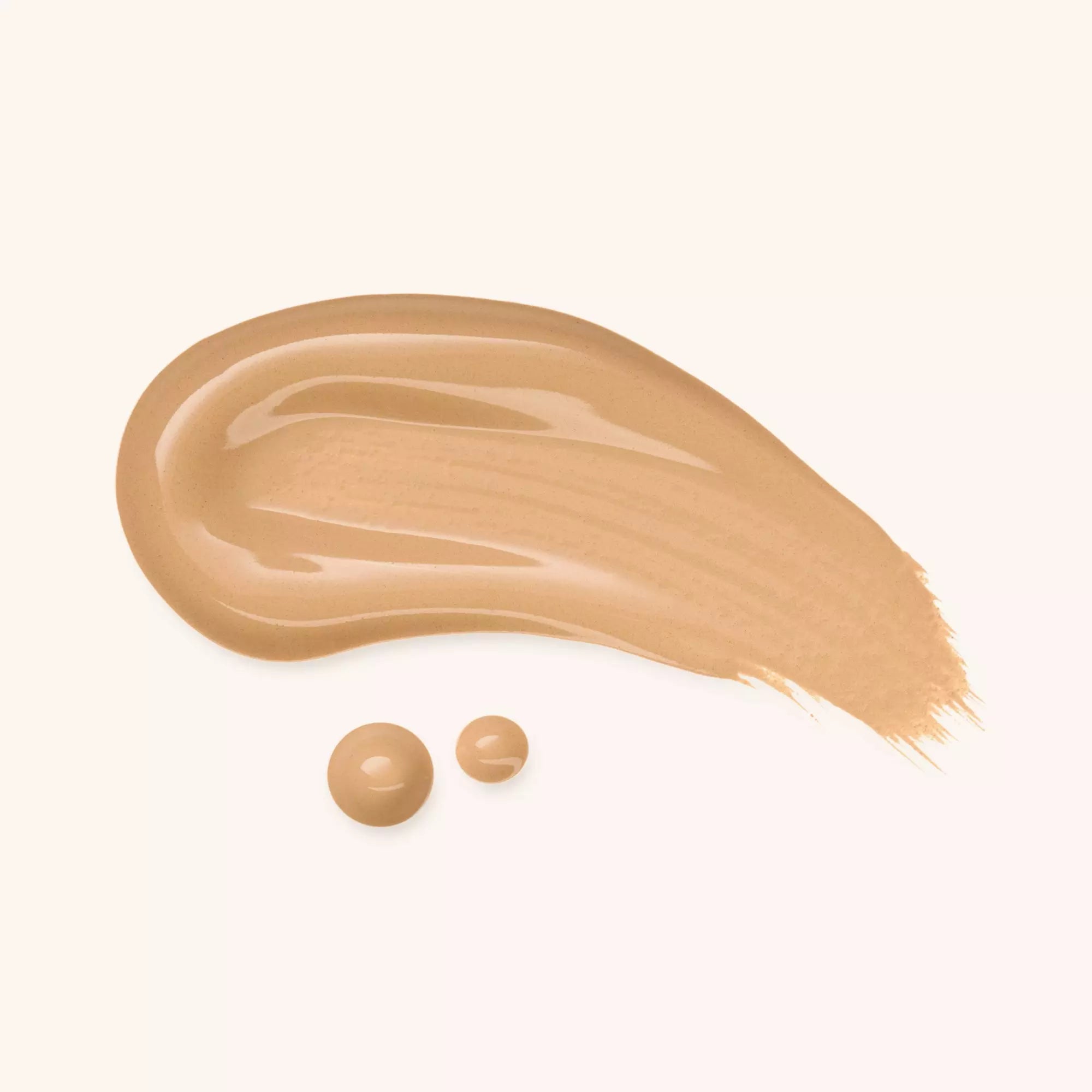 Swatch of Catrice Nude Drop Serum Foundation shade 040N with creamy matte texture