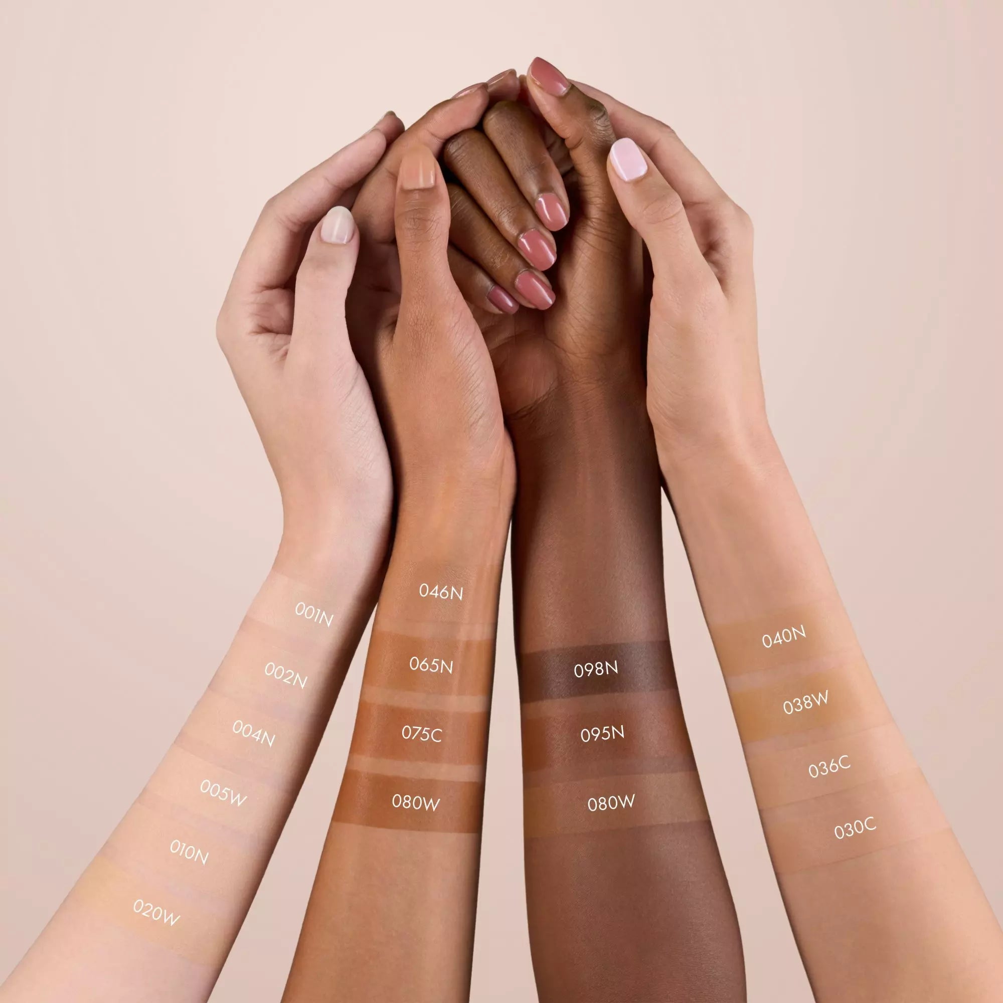 Catrice Nude Drop Tinted Serum Foundation swatches on diverse skin tones