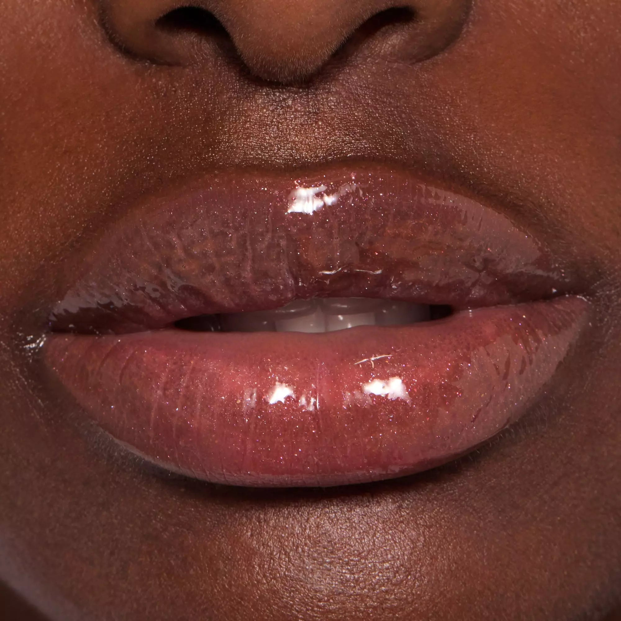 Catrice Plump It Up Lip Booster Lip Gloss -100 On Dark Skin Close Up 