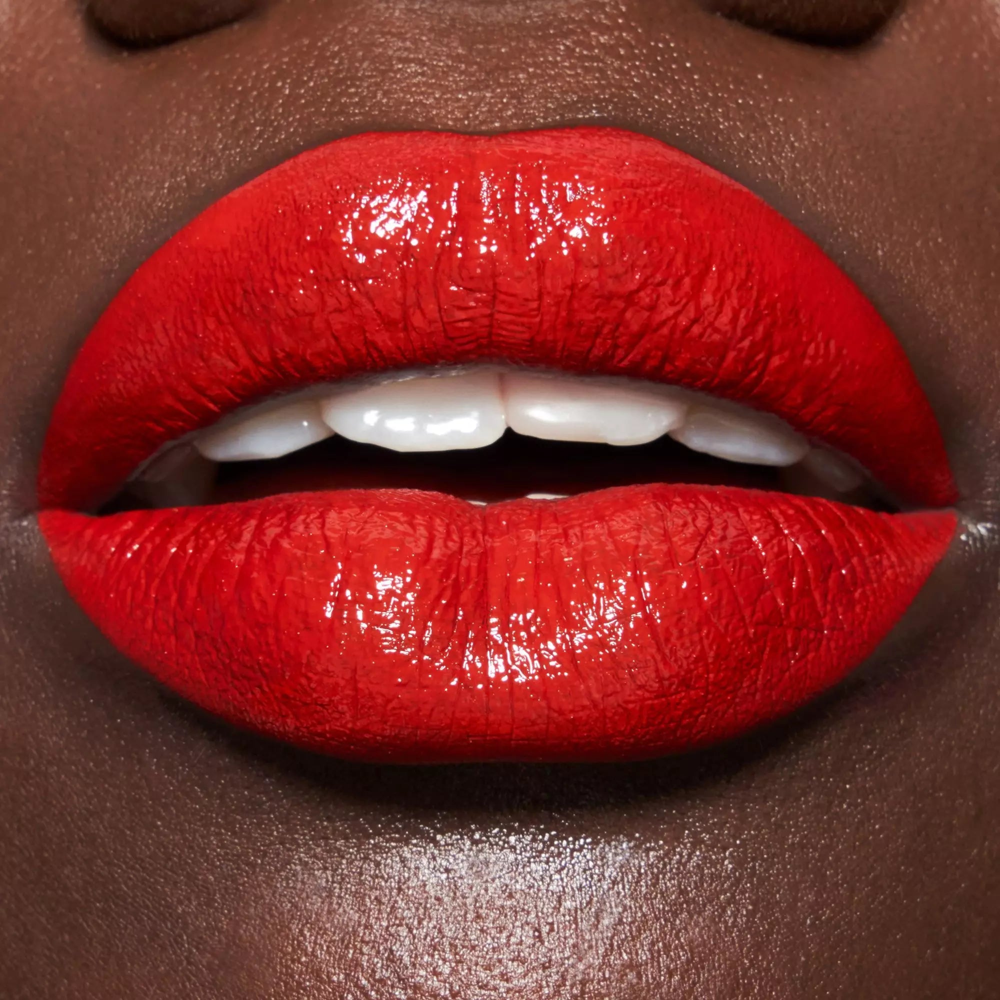 Catrice Shine Bomb Lip Lacquer - 040 About Last Night red lip on dark skin