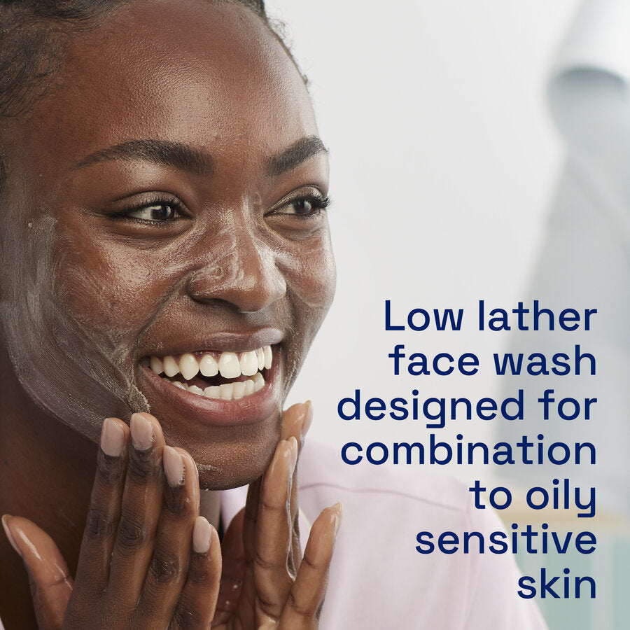 Foaming face wash for oily skin being applied by woman with glowing skin
