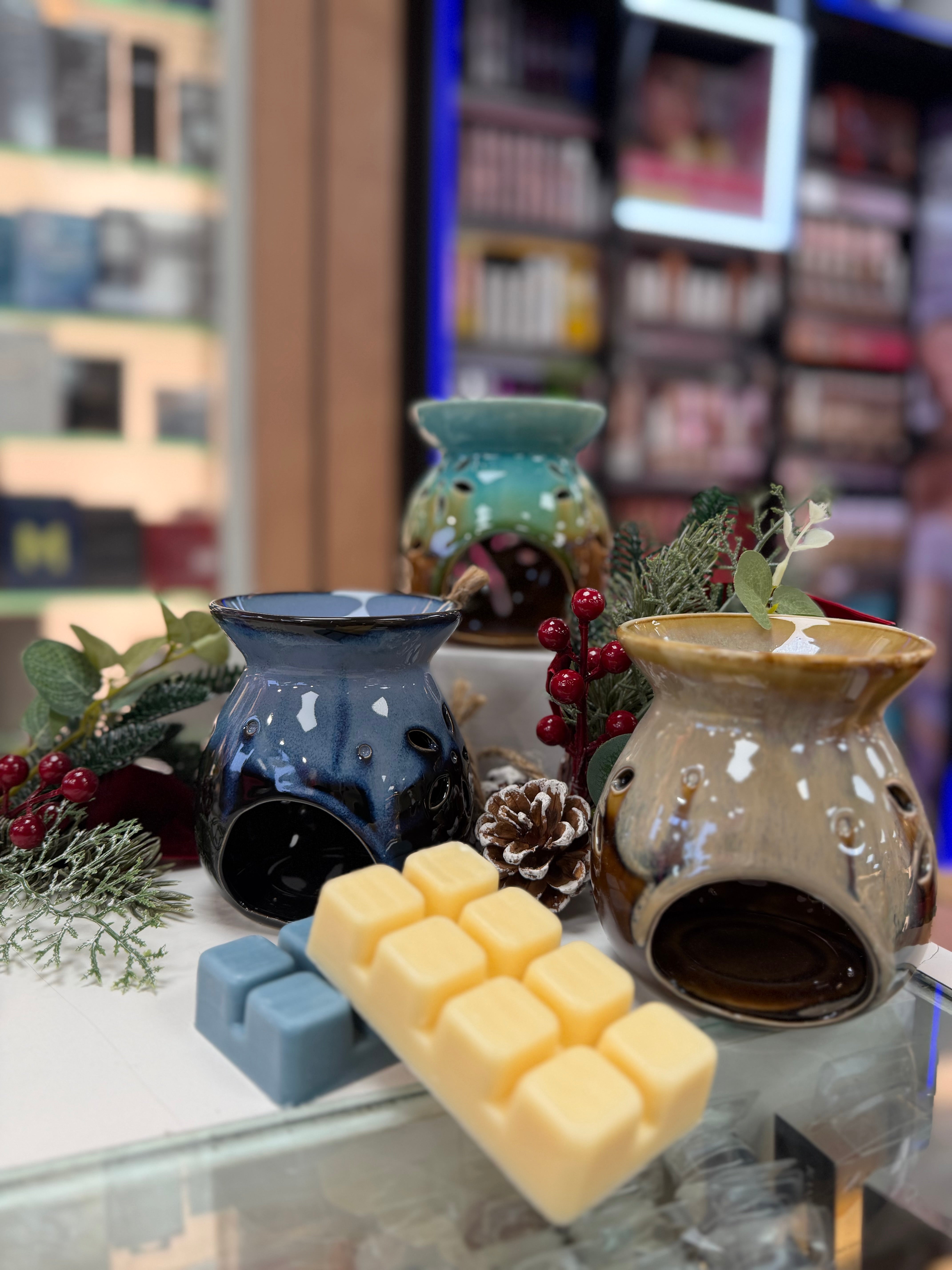 Dolphin tealight wax melt burner in teal & brown glaze with floral cut-outs – home gifts Ireland.