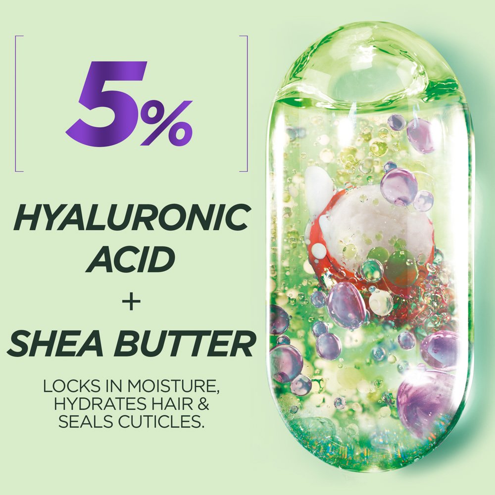 Cosmetic product with hyaluronic acid and shea butter ingredients on a green background