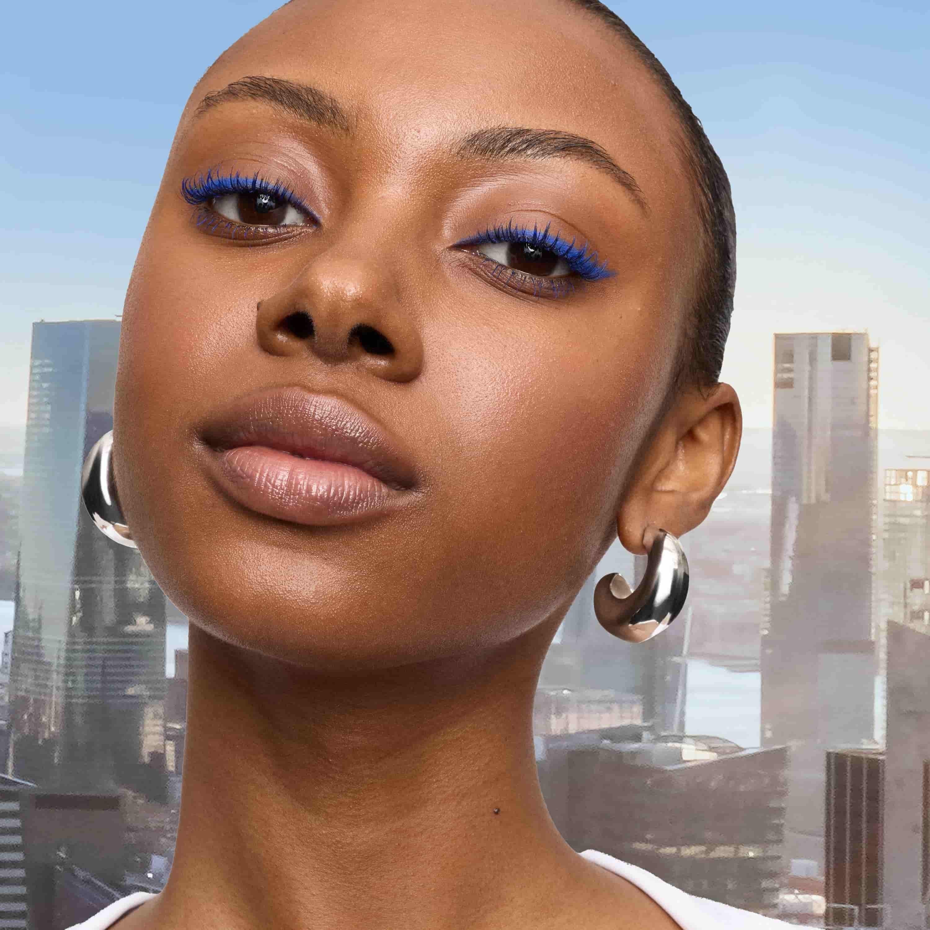 Maybelline Sky High Blue Mist mascara on model