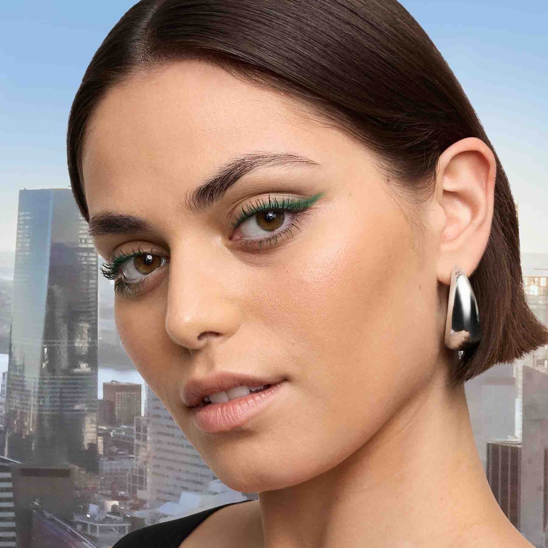 Maybelline Sky High Green Altitude mascara on lashes