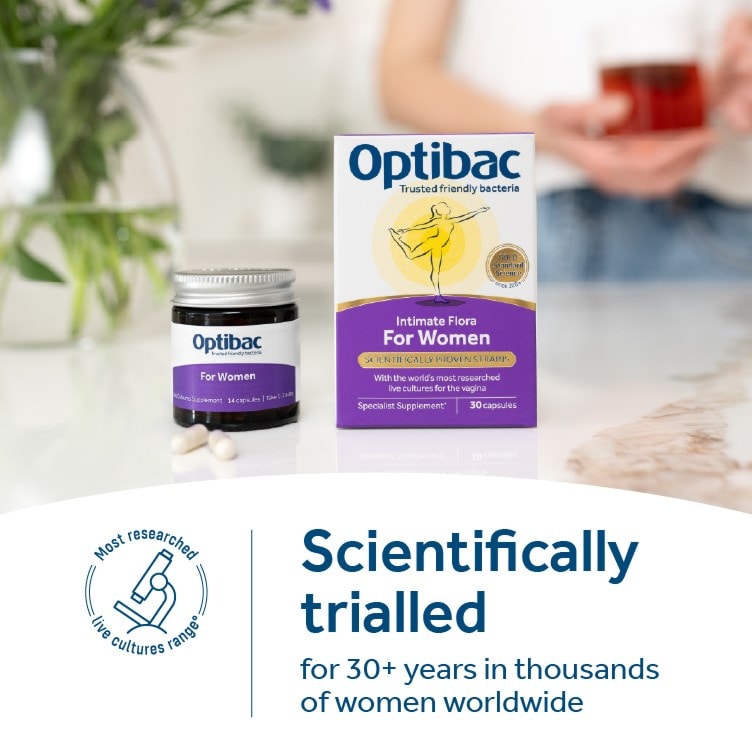 Hand holding Optibac For Women probiotic jar natural supplement option