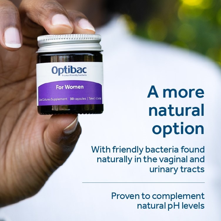 Woman holding Optibac For Women probiotic The natural option 
