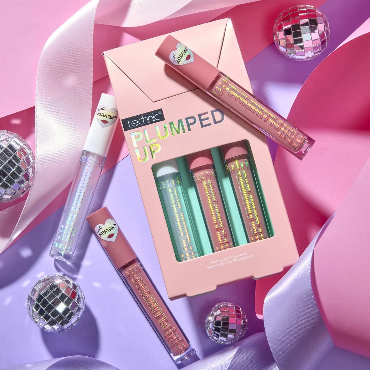 Technic Plumped Up Lip Gloss Gift Set with three glosses in colourful gift display