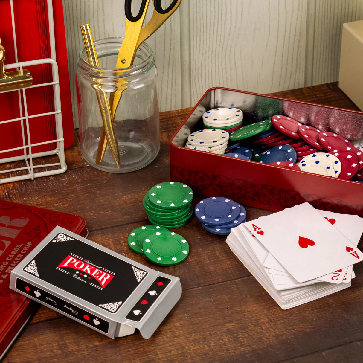 Poker cards and chips displayed beside the boxed deck — fun gift for friends or brothers