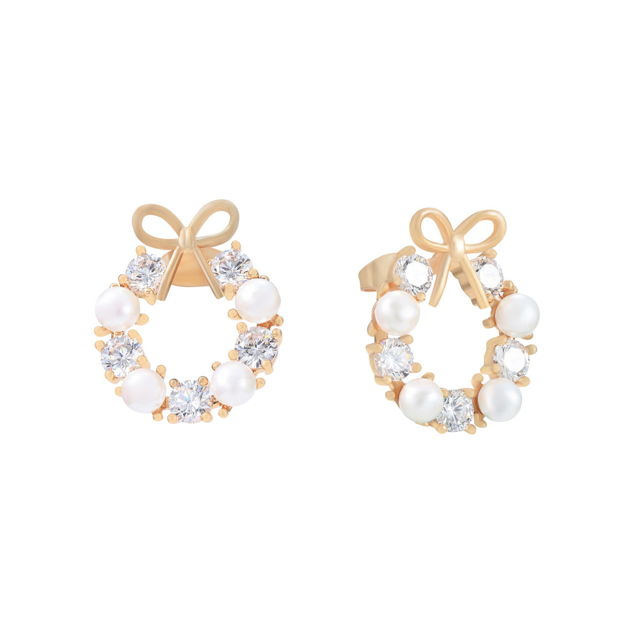 Tipperary Crystal pearl and bow gold crystal stud earrings on white background
