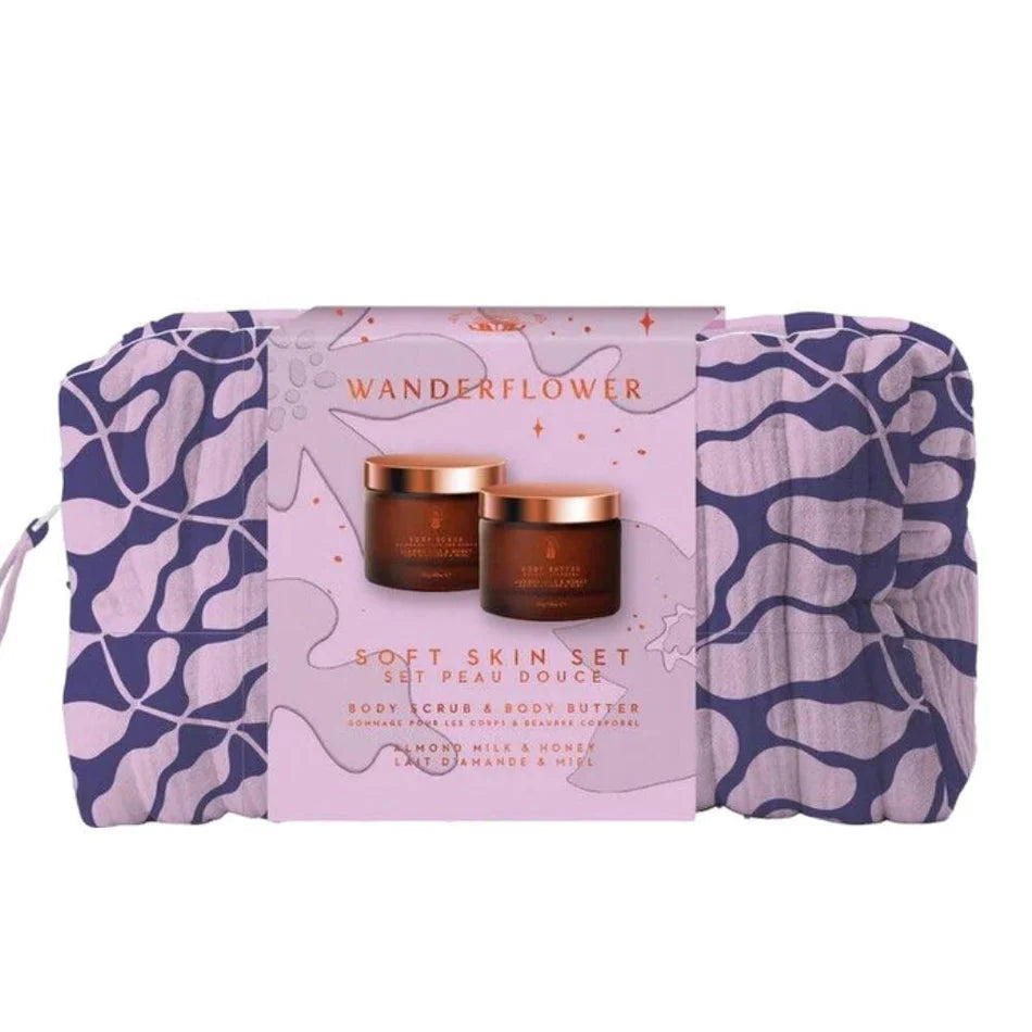 Wanderflower Soft Skin Bath & Body Gift Set in pink and navy patterned zip pouch with Almond Milk & Honey body care products